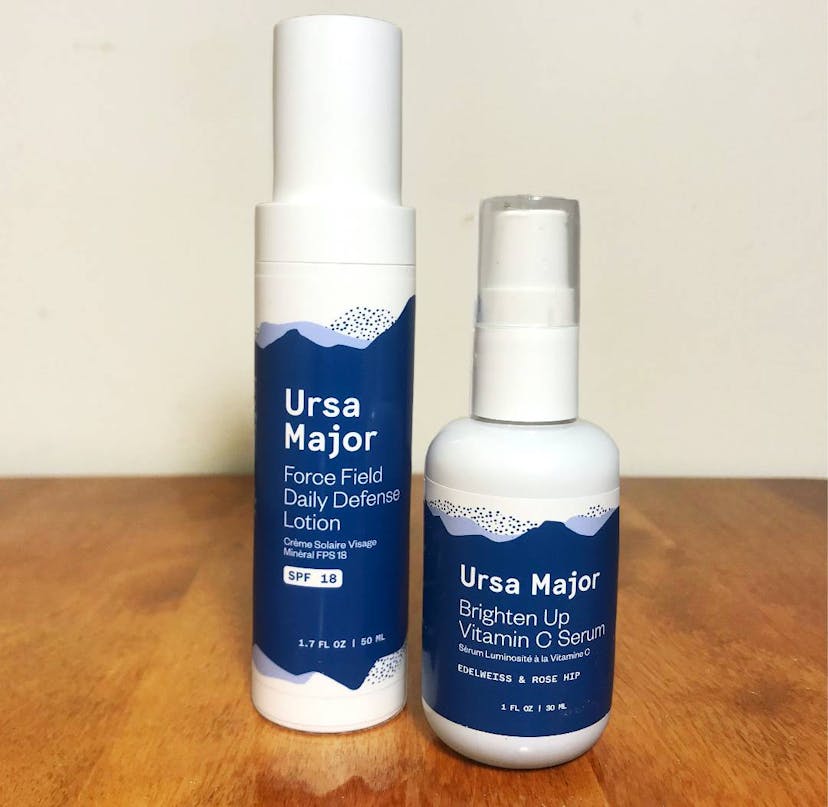 Two skincare products from clean skincare brand Ursa Major on a wooden table.