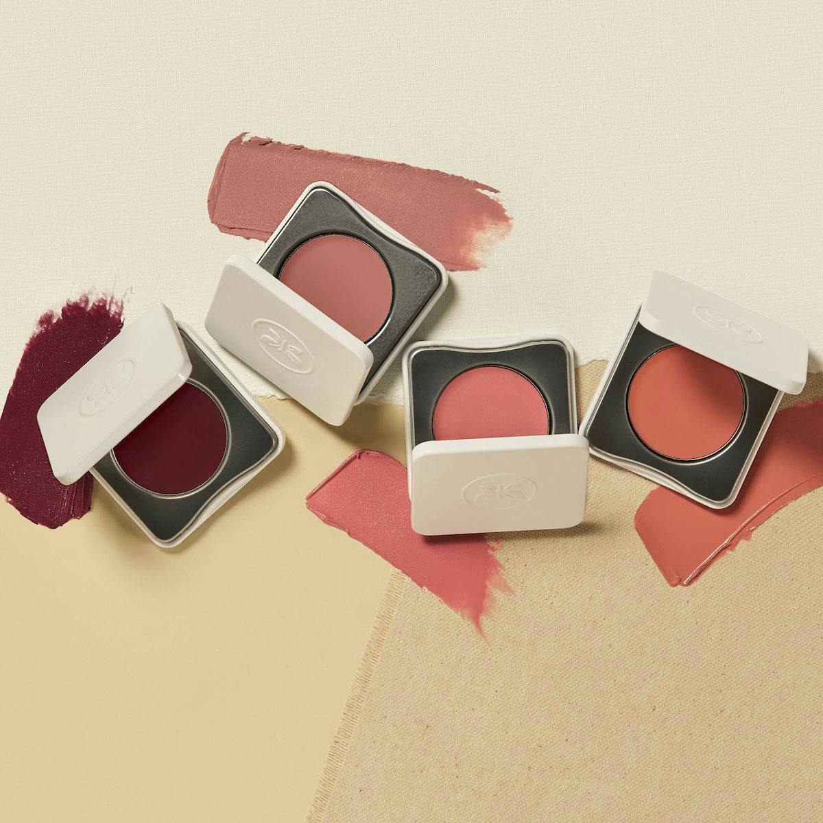 A selection of four Cream Cheek + Lip Colors from The Honest Company.