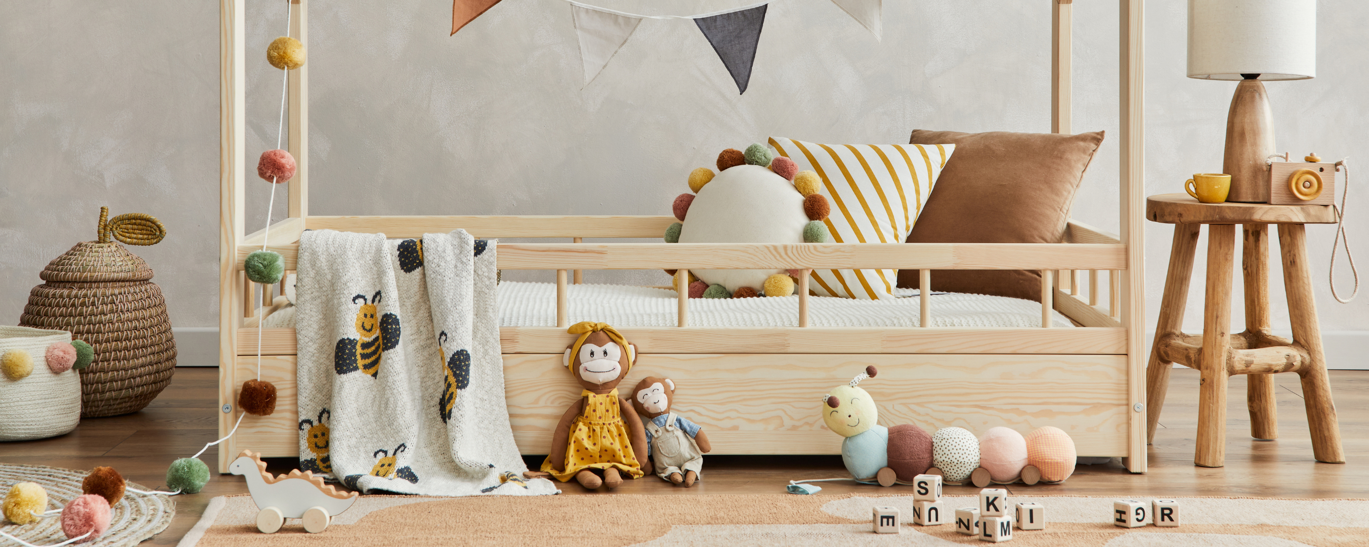 A child's room decorated with sustainable kids items and baby toys.