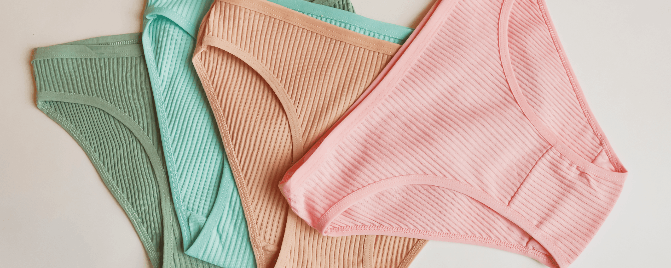 Four pairs of women's underwear in varying colors.