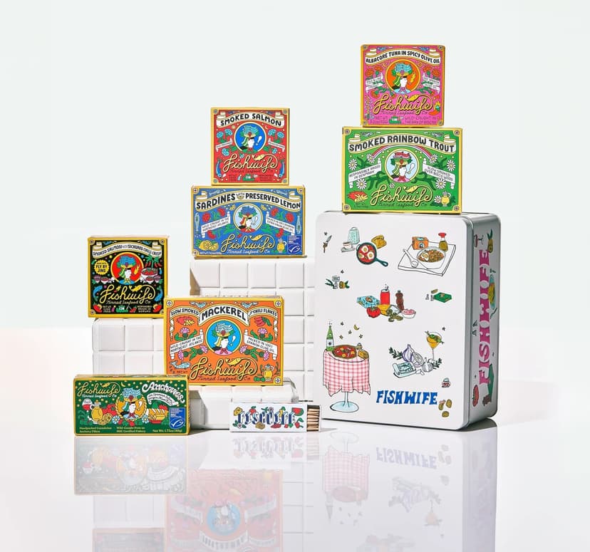 Colorful, illustrated boxes of tinned seafood all branded with the company name Fishwife.