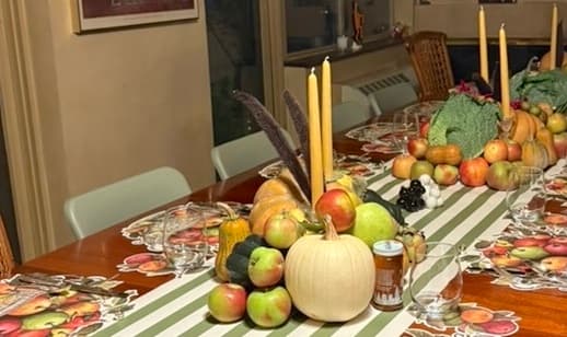 Beeswax taper candles on a fall table.